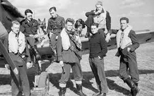 Pilots of No. 19 and No. 616 Squadrons pose by a Spitfire