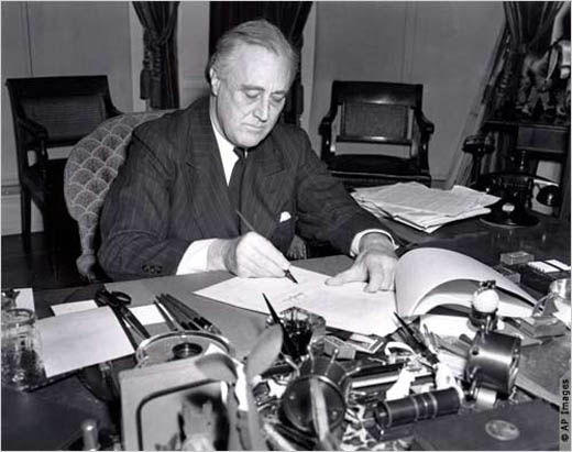 President Roosevelt Signs the Lend-Lease Act