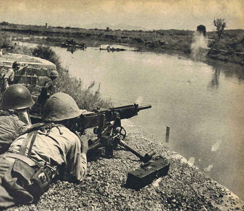 Japanese Soldier Firing a Type 92 Heavy Machine Gun