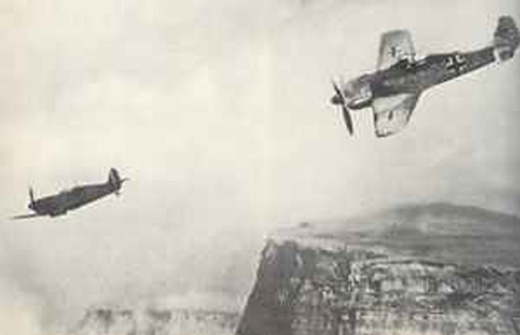 A New FW-190 Following a Spitfire