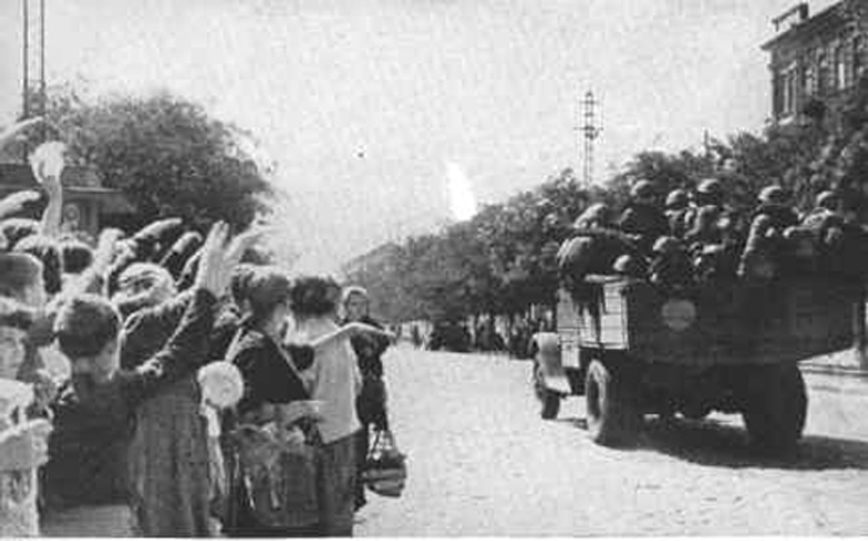 Citizens Cheering the Russian Rearguard As They Move Up