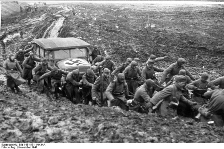 Soldiers Pulling a Car from the Mud