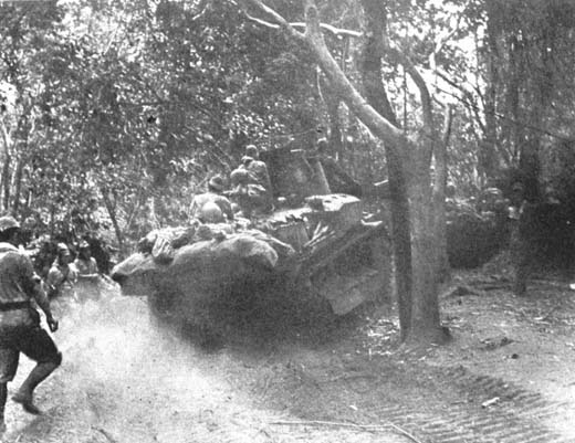 Japanese Tanks and Infantry Advance through Bataan Jungle