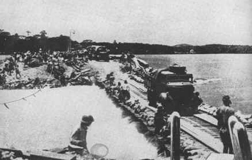 Japanese Trucks Crossing to Singapore Island