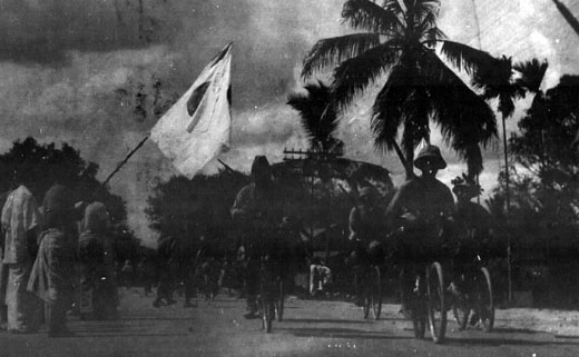 Japanese soldiers on bicycles