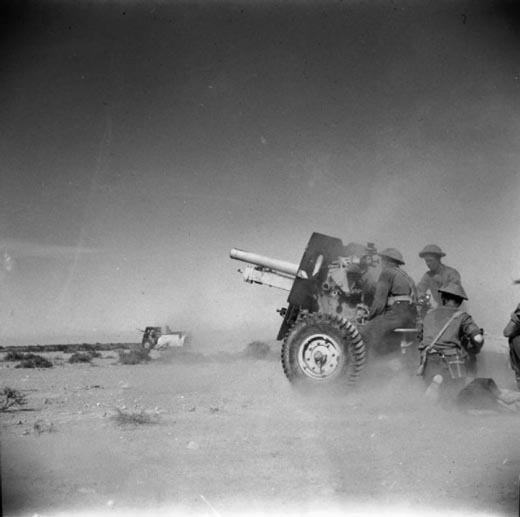 25-pdr field guns in action