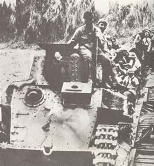 Japanese tanks crossing a  bridge