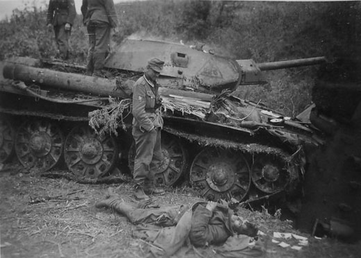 German Soldiers Inspecting Destroyed Soviet Tank