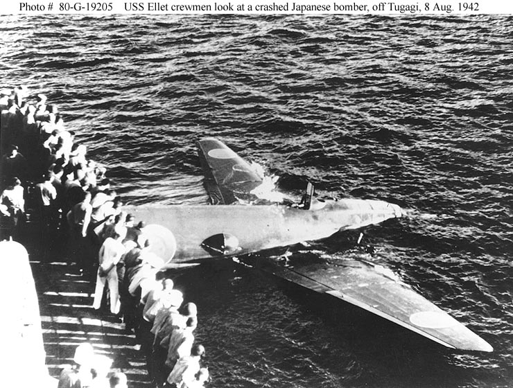 Destroyer Crewmen Looking at Wreckage of Japanese Plane