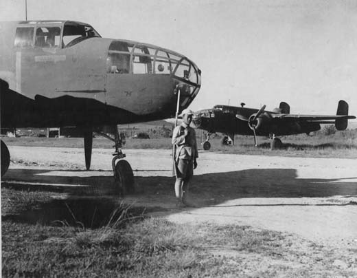 Chinese Soldier Guarding a B-25