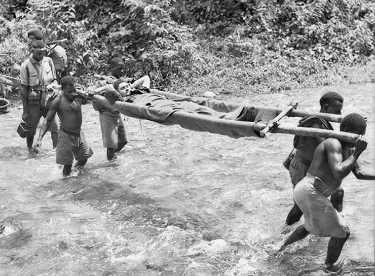 Natives Carrying the Wounded