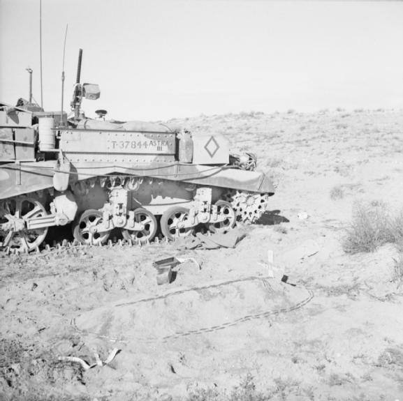 Officer's Grave Next to His Tank