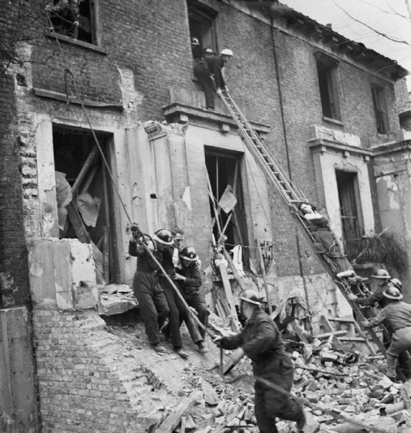 Helping Out Of a Bomb-Damaged Building