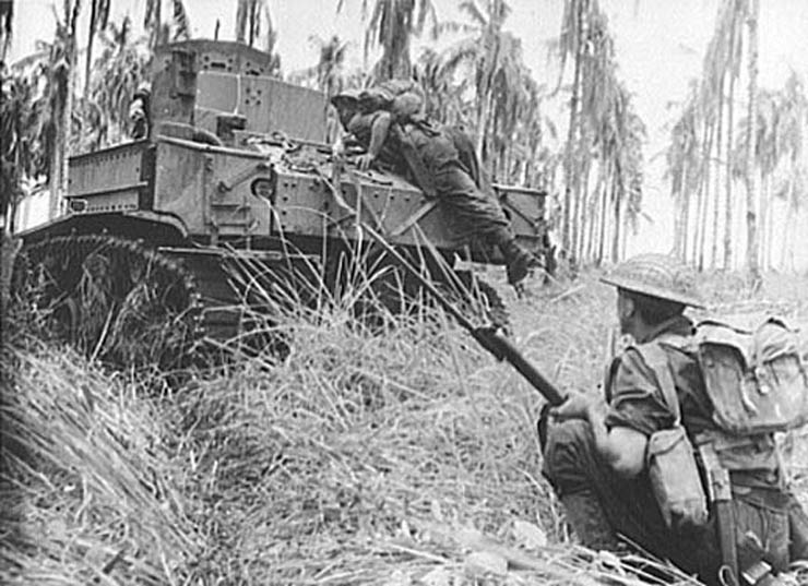 Australians Behind an M3 Stuart Tank