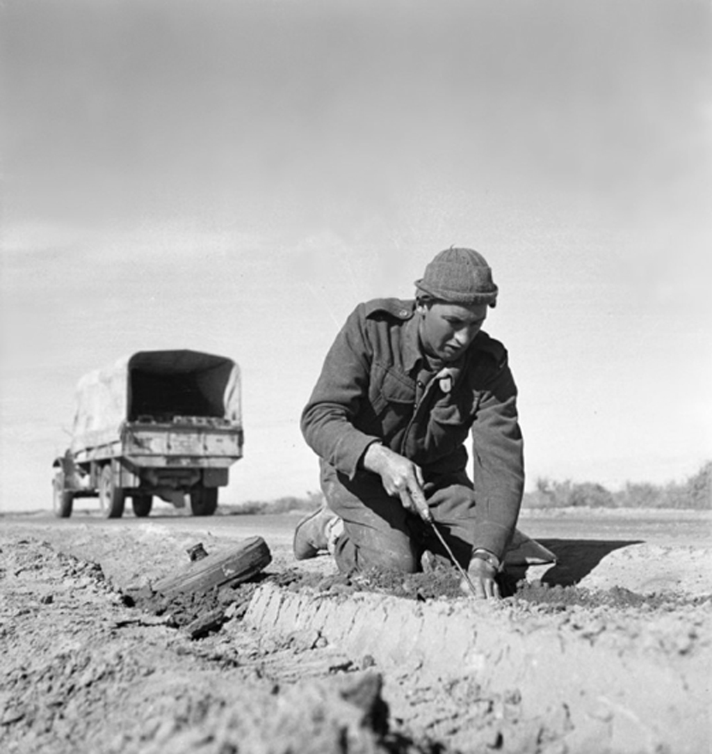 New Zealand Sapper Extracting Mines