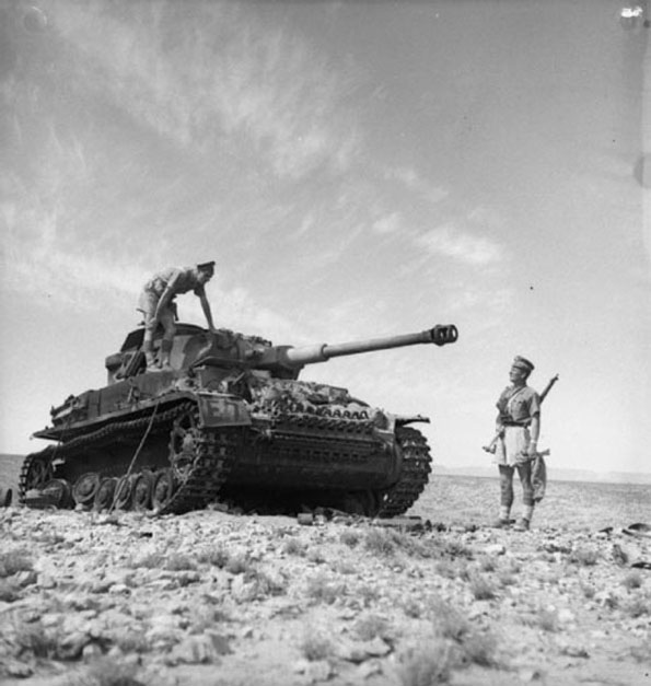 a knocked-out German <i>PzKpfw IV</i> tank