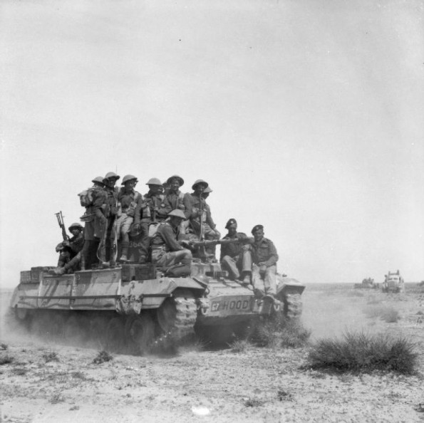 A Valentine Tank Carrying Infantry