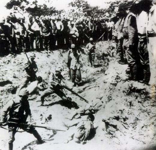 Japanese Soldiers Bayonet Chinese Prisoners