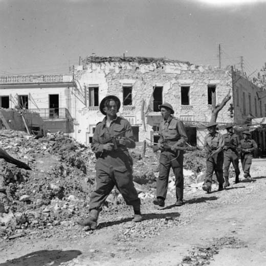 British Troops Advance Warily Through Bizerta