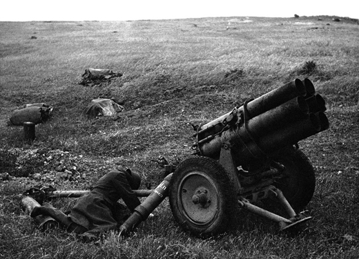 Body of a dead German near a nebelwerfer