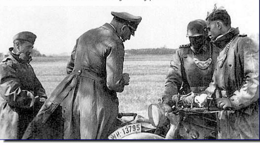 German officer confers with the field gendarmes