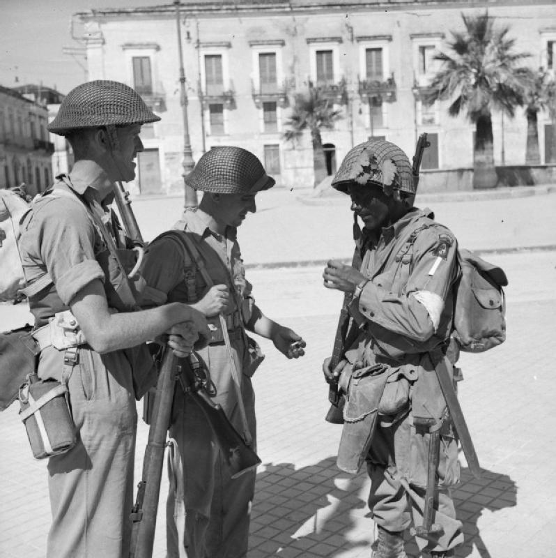 British troops with an American paratrooper