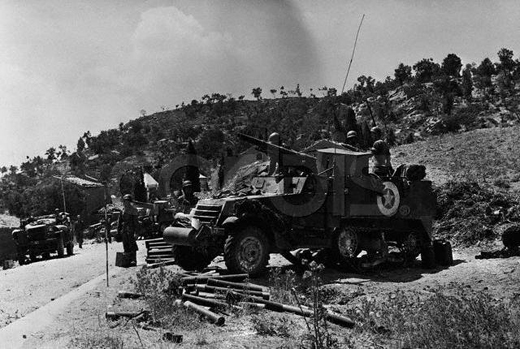 American Soldiers Man a Light Tank