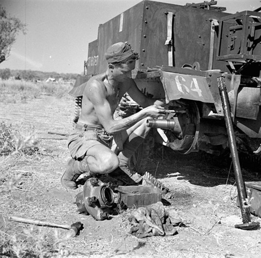 repairing his Universal Carrier