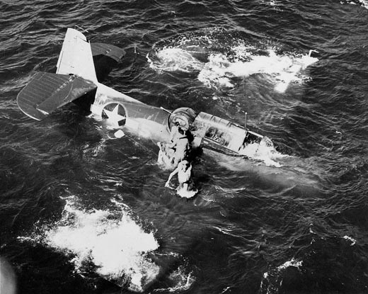 Crew of a TBF Avenger Scrambles from Sinking Aircraft