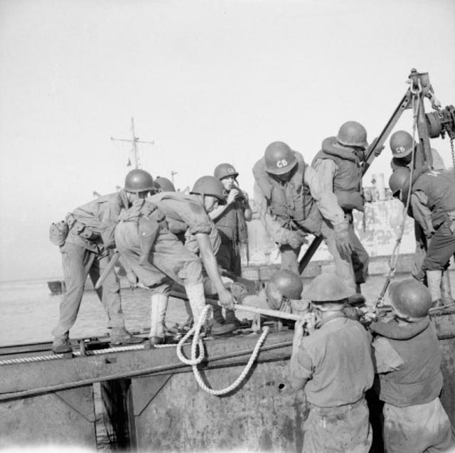 Casualties Being Moved to Landing Craft