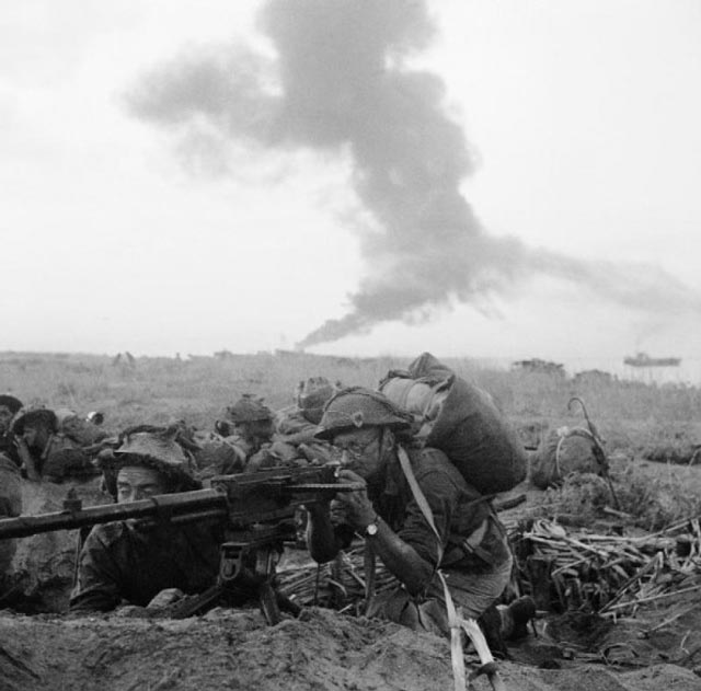 British Soldiers Man a Machine Gun Post