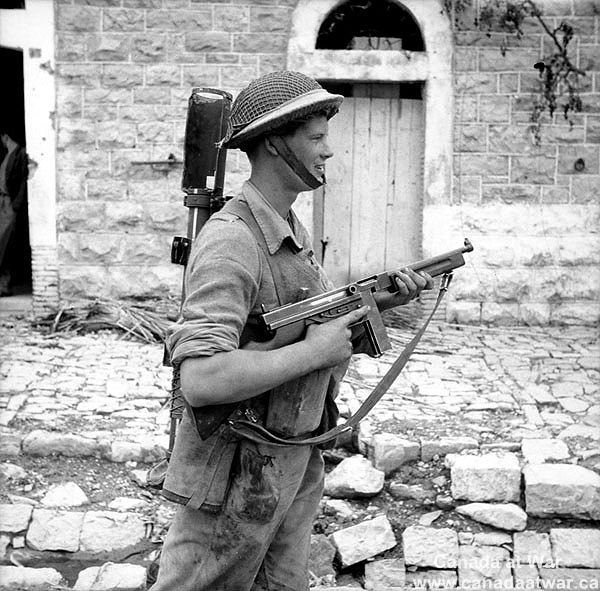 Corp E.H. Pruner with an Anti-Tank Weapon and Submachine Gun