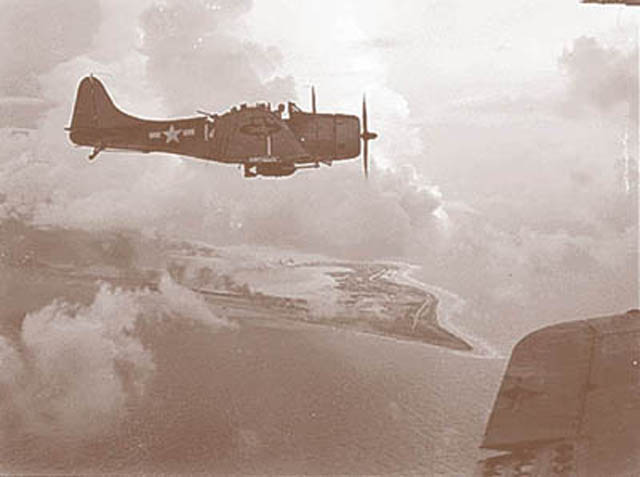 US Navy Dauntless Over Wake