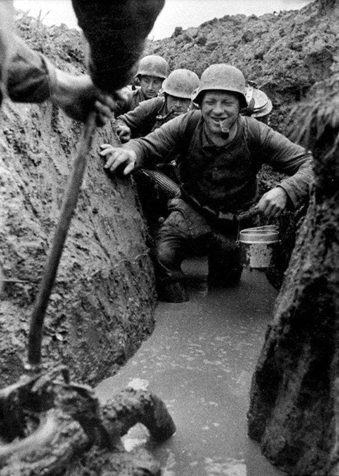 German soldiers in the flooded trenches