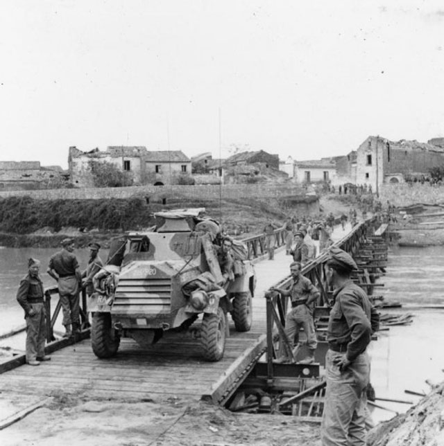 Light Reconnaissance Car Crossing a Bailey Bridge