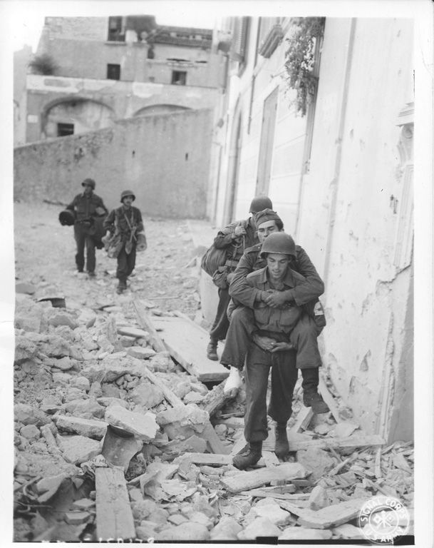 US Medic Carries Wounded German