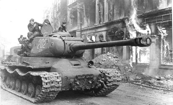 German 'Tiger' Moving through a Burning Village