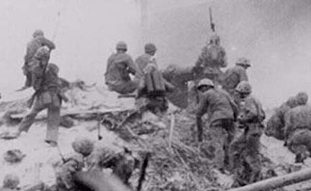 Marines on top of Japanese Bomb Shelter