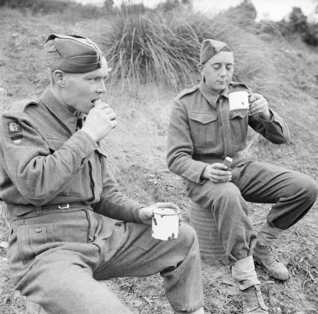 Soldiers Enjoying Tea and Cakes