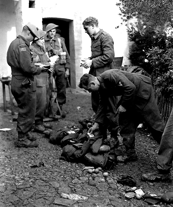 Canadian Soldiers Searching German Prisoners