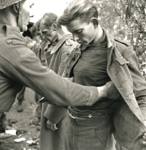 Captured Germans Being Searched