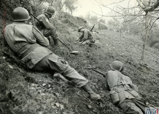 US Soldier Removing German Mine