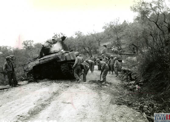 US Soldiers Reclaiming Tank