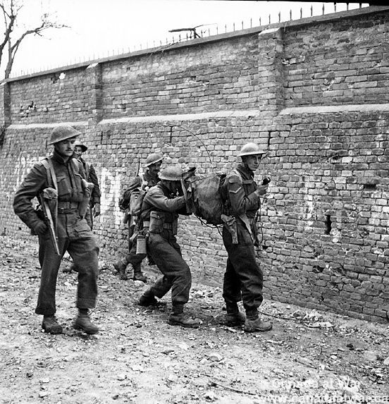 Edmonton Regiment Soldiers Use Walkie-Talkie