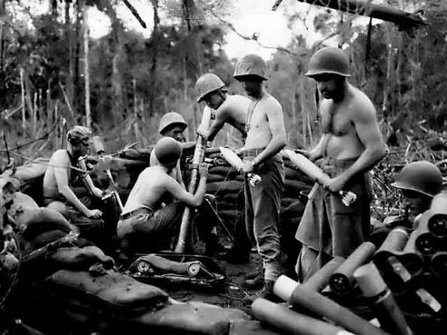 US Marines with a Mortar in Action