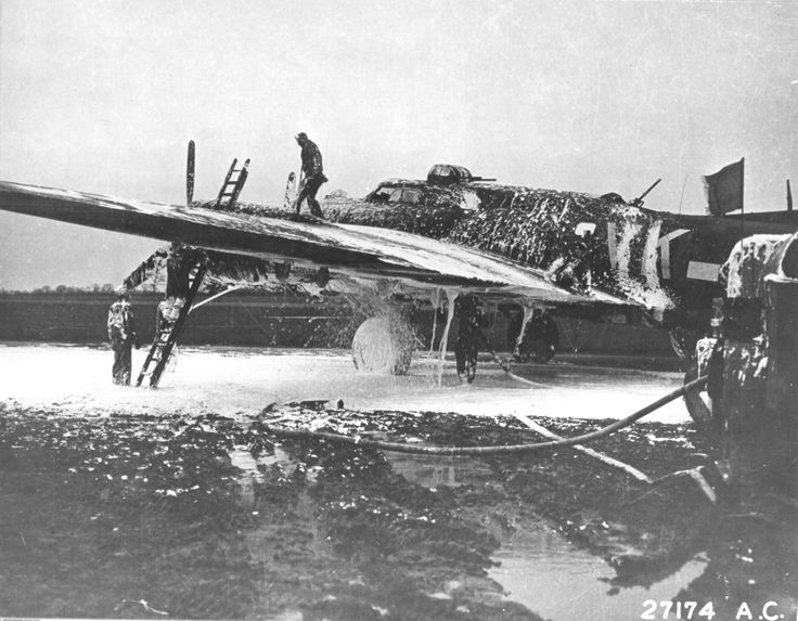 Ground Crew Extinguishing Fire aboard B-17