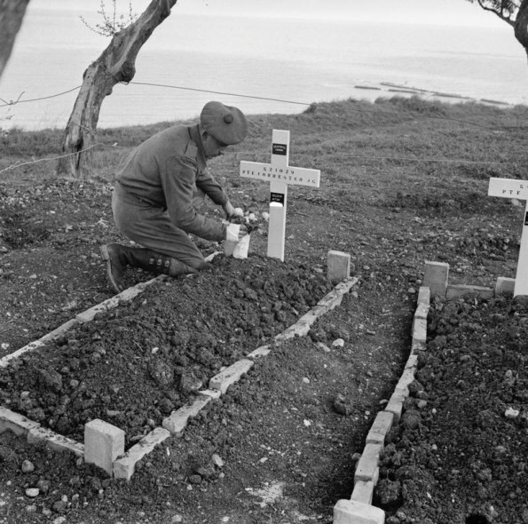 Placing Flowers on a Grave