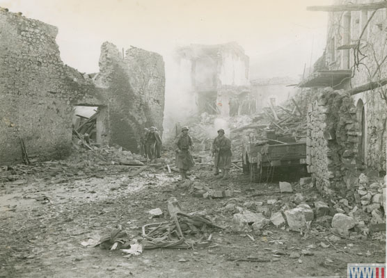 Soldiers in bomb-damaged town