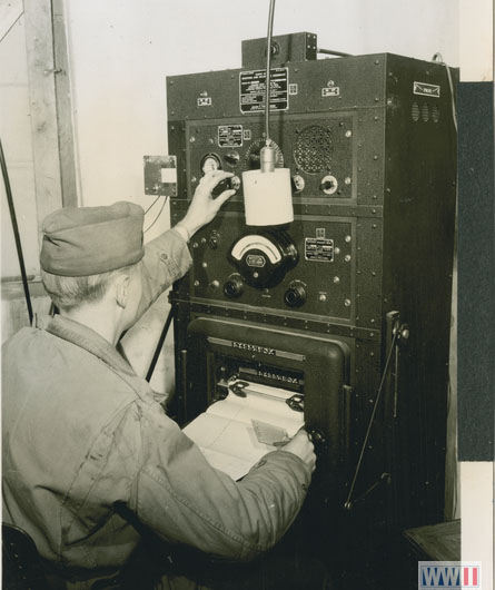 US soldier prepares radio transmitter