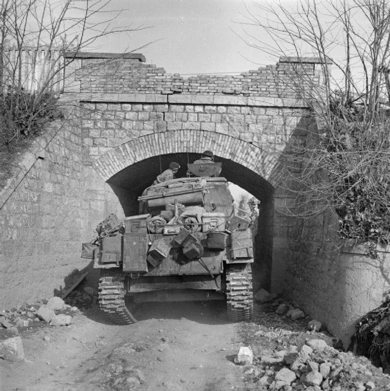 Tank Squeezes under a Low Railway Bridge